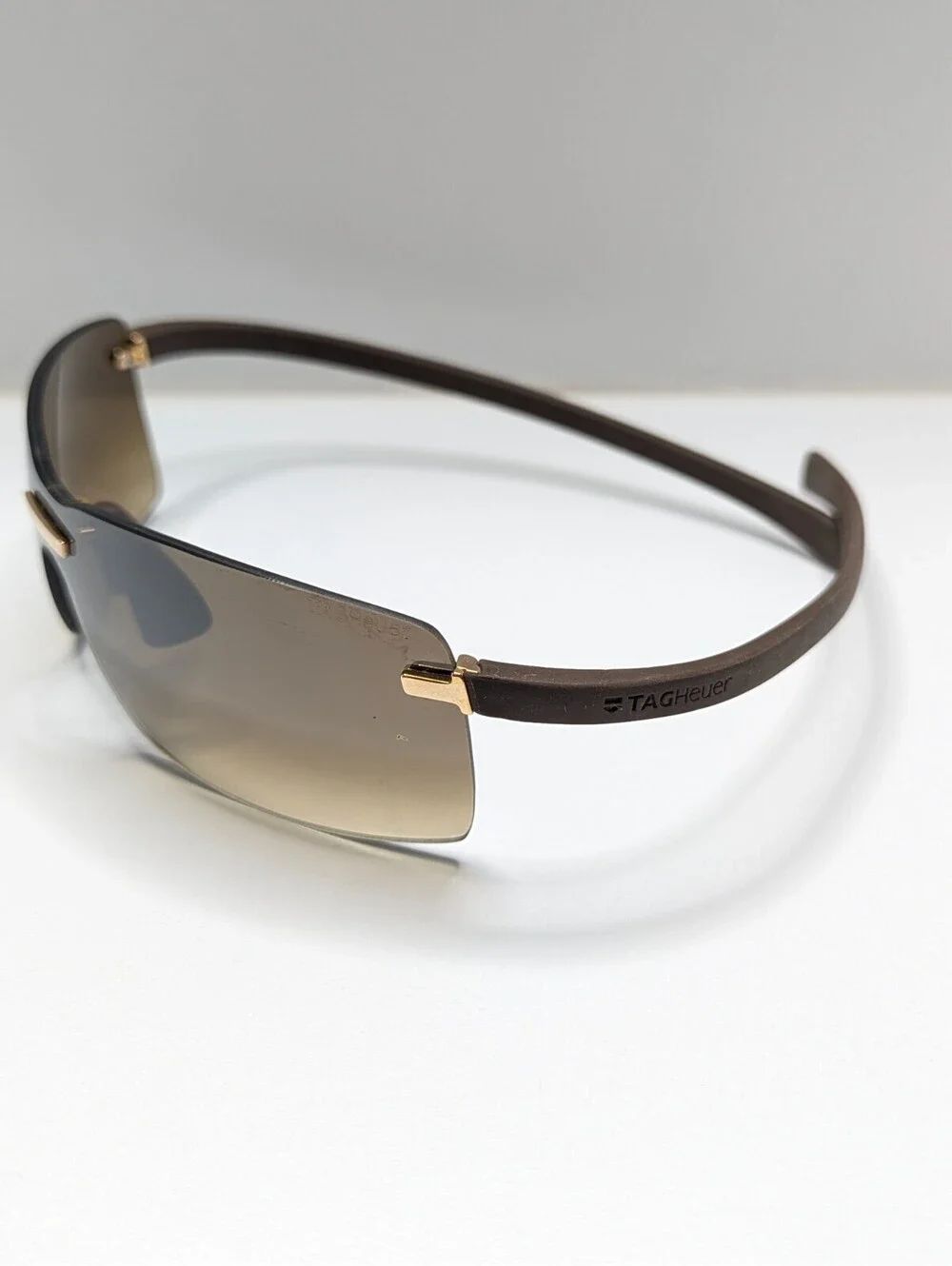 TAG Heuer TH5106 Brown Gradient Rimless Wraparound Men’s Sunglasses 62-00-140